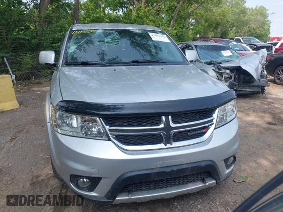 2012 Dodge Journey SXT with VIN 3C4PDDBG1CT323727, listed as a IAAI auction lot 42473238 with 77,035 mi miles and . Bid and sale history available at DreamBid. Image 12.