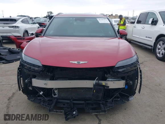 2023 Genesis GV60 Advanced z VIN KMUKCDTC9PU017098, wystawiony jako IAAI lot #41787572 z przebiegiem 1 685 mil mil oraz . Historia ofert i sprzedaży dostępna na DreamBid. Obrazek 13.