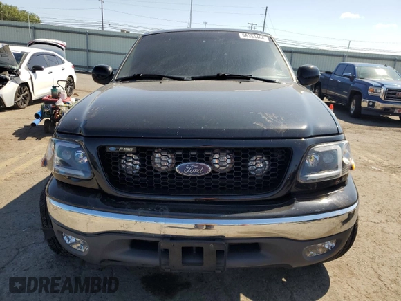 1999 Ford F-150 XL с VIN 2FTRX08L4XCA00426, выставлен на аукционе Copart как лот 68354464 с пробегом 157 539 миль миль и Списание • Salvage title. История ставок и продаж доступна на DreamBid. Изображение 5.