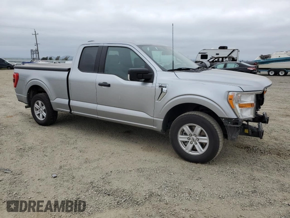 2021 Ford F-150 XL with VIN 1FTEX1CB2MKE77401, listed as a Copart auction lot 52754445 with 87,029 mi miles and Salvage title. Bid and sale history available at DreamBid. Image 4.