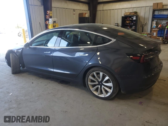 2018 Tesla Model 3 Long Range Battery with VIN 5YJ3E1EA5JF059313, listed as a Copart auction lot 51039105 with 73,706 mi miles and Salvage Title. Bid and sale history available at carsss.com. Image 2.