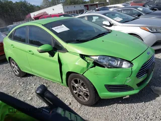 2014 Ford Fiesta SE with VIN 3FADP4BJ8EM226260, listed as a IAAI auction lot 41833140 with 188,917 mi miles and . Bid and sale history available at DreamBid. Image 1.