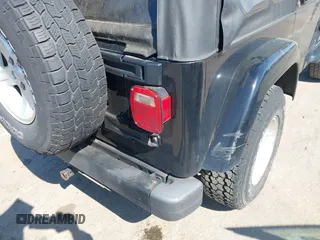 2005 Jeep Wrangler X with VIN 1J4FA39S35P372731, listed as a IAAI auction lot 41875121 with 146,034 mi miles and . Bid and sale history available at DreamBid. Image 6.