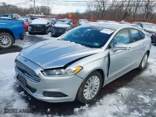 2014 Ford Fusion SE Hybrid with VIN 3FA6P0LU6ER334941, listed as a IAAI auction lot 41444793 with 144,332 mi miles. Bid and sale history available at carsss.com. Image 2.