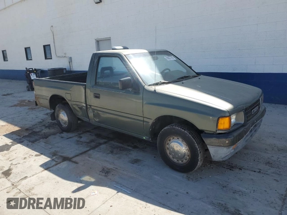 1994 Isuzu Pickup S z VIN JAACL11L2R7221226, wystawiony jako Copart lot #59027295 z przebiegiem 129 494 mil mil oraz Tytuł czysty. Historia ofert i sprzedaży dostępna na DreamBid. Obrazek 4.