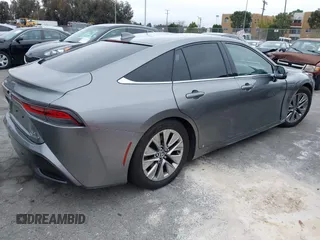2023 Toyota Mirai XLE with VIN JTDAAAAA5PA007657, listed as a IAAI auction lot 41814468 with 12,809 mi miles. Bid and sale history available at carsss.com. Image 4.