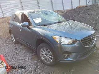 2016 Mazda CX-5 Touring with VIN JM3KE4CY5G0771252, listed as a IAAI auction lot 42138637 with 106,767 mi miles and . Bid and sale history available at carsss.com. Image 1.