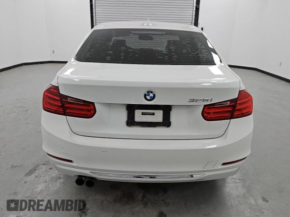 2012 BMW 3 Series 328i z VIN WBA3A5C57CF342137, wystawiony jako Copart lot #52630715 z przebiegiem 133 308 mil mil oraz Czysty tytuł • Clean title. Historia ofert i sprzedaży dostępna na DreamBid. Obrazek 6.