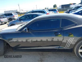 2011 Chevrolet Camaro 1LT z VIN 2G1FB1ED6B9103429, wystawiony jako IAAI lot #41884662 z przebiegiem 135 556 mil mil oraz . Historia ofert i sprzedaży dostępna na DreamBid. Obrazek 14.
