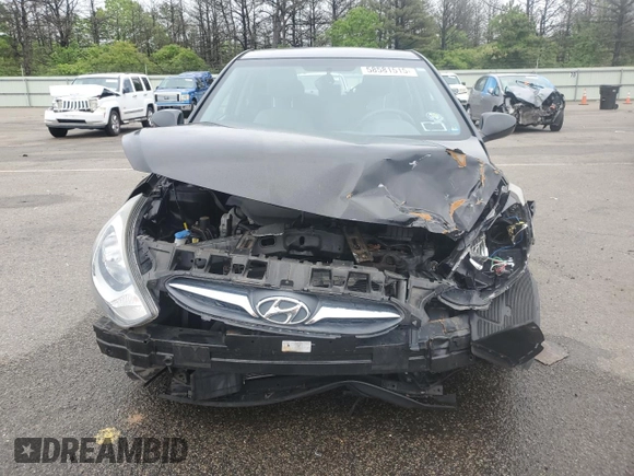 2014 Hyundai Accent GLS z VIN KMHCT4AE6EU705838, wystawiony jako Copart lot #58581515 z przebiegiem 40 265 mil mil oraz Szkoda całkowita • Salvage title. Historia ofert i sprzedaży dostępna na DreamBid. Obrazek 5.