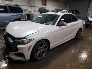 2016 BMW 2 Series M235i xDrive with VIN WBA1J9C50GV372185, listed as a Copart auction lot 88039785 with 84,187 mi miles and Salvage Title. Bid and sale history available at carsss.com. Image 1.