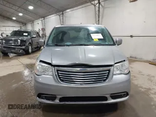 2013 Chrysler Town & Country Touring with VIN 2C4RC1BG0DR775313, listed as a IAAI auction lot 41738917 with 209,378 mi miles. Bid and sale history available at carsss.com. Image 12.