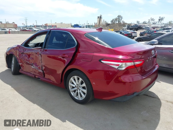 2020 Toyota Camry LE with VIN 4T1C11AK9LU991305, listed as a IAAI auction lot 41976371 with 57,422 mi miles and . Bid and sale history available at carsss.com. Image 3.