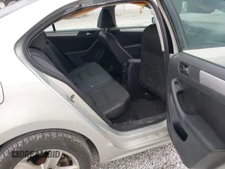2012 Volkswagen Jetta TDI w/Premium with VIN 3VWLL7AJ2CM317216, listed as a IAAI auction lot 41731204 with 320,474 mi miles and . Bid and sale history available at DreamBid. Image 8.