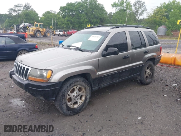 1999 Jeep Grand Cherokee Laredo with VIN 1J4G258SXXC518647, listed as a IAAI auction lot 42124724 with 229,668 mi miles and . Bid and sale history available at DreamBid. Image 2.