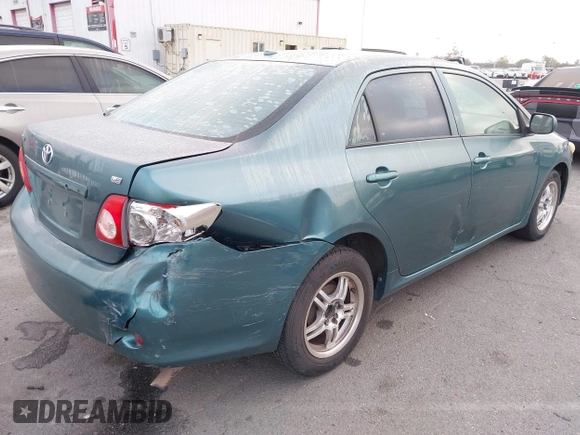 2009 Toyota Corolla with VIN 1NXBU40E39Z047881, listed as a IAAI auction lot 42078719 with 204,258 mi miles. Bid and sale history available at carsss.com. Image 6.