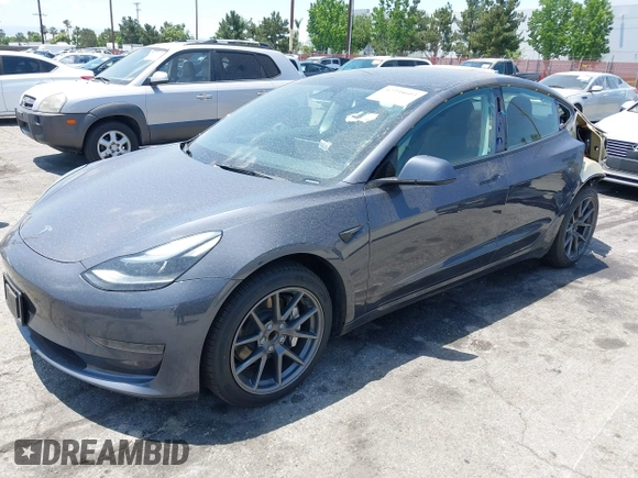 2023 Tesla Model 3 with VIN 5YJ3E1EA4PF400306, listed as a IAAI auction lot 42398603 with 18,551 mi miles and . Bid and sale history available at DreamBid. Image 20.