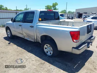 2007 Nissan Titan XE with VIN 1N6AA07AX7N231823, listed as a IAAI auction lot 42300587 with 210,735 mi miles and . Bid and sale history available at DreamBid. Image 3.