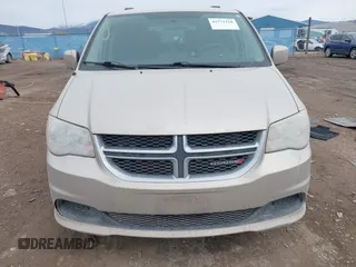 2014 Dodge Grand Caravan SXT z VIN 2C4RDGCG8ER253786, wystawiony jako IAAI lot #41771226 z przebiegiem 175 507 mil mil oraz . Historia ofert i sprzedaży dostępna na DreamBid. Obrazek 12.