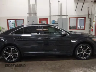 2014 Ford Taurus Limited z VIN 1FAHP2J8XEG112565, wystawiony jako IAAI lot #41554413 z przebiegiem 180 870 mil mil oraz . Historia ofert i sprzedaży dostępna na DreamBid. Obrazek 13.