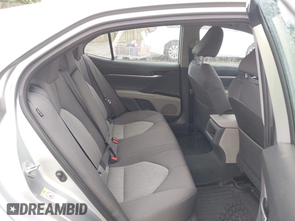 2019 Toyota Camry LE z VIN 4T1B11HK0KU698215, wystawiony jako IAAI lot #42319699 z przebiegiem 54 864 mil mil oraz . Historia ofert i sprzedaży dostępna na DreamBid. Obrazek 8.