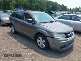 2013 Dodge Journey American Value z VIN 3C4PDCAB0DT691429, wystawiony jako IAAI lot #42514055 z przebiegiem 213 593 mil mil oraz . Historia ofert i sprzedaży dostępna na DreamBid. Obrazek 1.