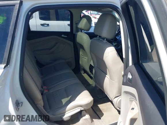 2013 Ford Escape SEL with VIN 1FMCU0HX1DUB99590, listed as a IAAI auction lot 41987910 with 129,954 mi miles. Bid and sale history available at carsss.com. Image 8.