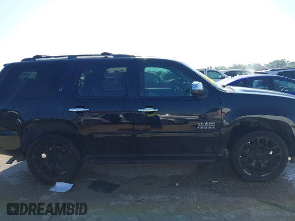2011 Chevrolet Tahoe LT with VIN 1GNSCBE08BR183366, listed as a IAAI auction lot 42343281 with 211,674 mi miles and . Bid and sale history available at DreamBid. Image 13.