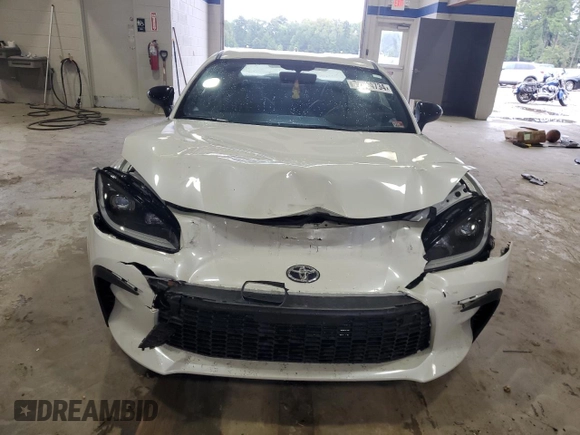 2023 Toyota GR86 Premium with VIN JF1ZNBE10P9765758, listed as a Copart auction lot 72064734 with 9,651 mi miles and Salvage Title. Bid and sale history available at carsss.com. Image 5.