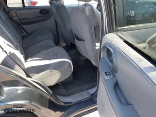 2004 Chevrolet TrailBlazer LS with VIN 1GNDT13S142391821, listed as a IAAI auction lot 41860650 with 184,915 mi miles. Bid and sale history available at carsss.com. Image 8.