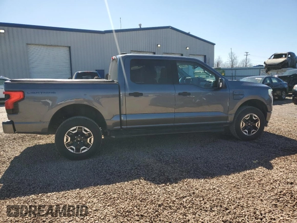 2023 Ford F-150 Lightning Pro z VIN 1FTVW1EL8PWG10894, wystawiony jako Copart lot #50988655 z przebiegiem 34 020 mil mil oraz Szkody całkowita. Historia ofert i sprzedaży dostępna na DreamBid. Obrazek 12.