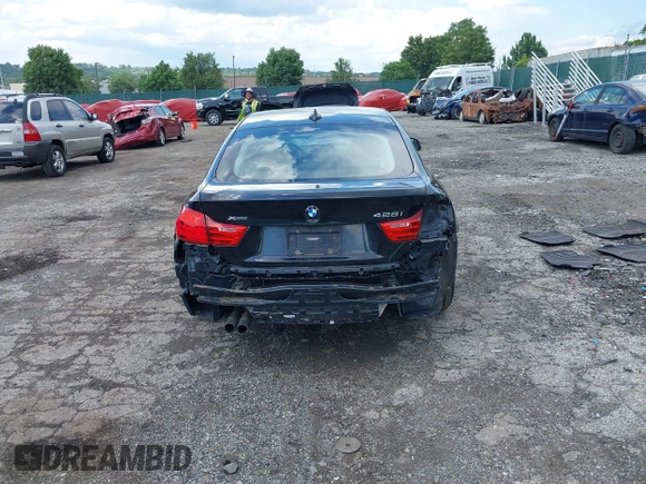 2015 BMW 4 Series 428i xDrive with VIN WBA4C9C52FD331620, listed as a IAAI auction lot 42556526 with 115,674 mi miles and . Bid and sale history available at DreamBid. Image 17.