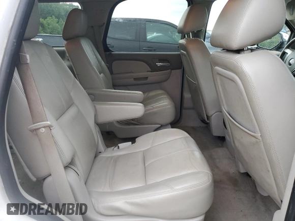 2011 GMC Yukon SLT z VIN 1GKS2CE00BR150352, wystawiony jako Copart lot #61031085 z przebiegiem 258 142 mil mil oraz Czysty tytuł • Clean title. Historia ofert i sprzedaży dostępna na DreamBid. Obrazek 11.