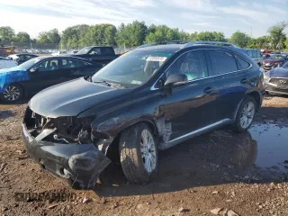 2011 Lexus RX 450h with VIN JTJBC1BA0B2041048, listed as a Copart auction lot 63090535 with 202,422 mi miles and Salvage title. Bid and sale history available at DreamBid. Image 1.