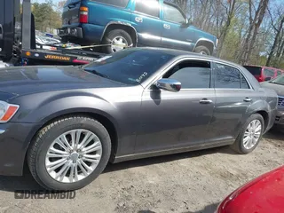 2013 Chrysler 300 C with VIN 2C3CCAKT2DH567348, listed as a IAAI auction lot 41909284 with 110,710 mi miles and . Bid and sale history available at DreamBid. Image 14.