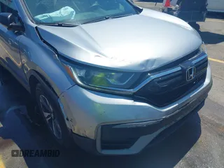 2020 Honda CR-V LX with VIN 7FARW1H26LE002413, listed as a IAAI auction lot 42318905 with 63,698 mi miles and . Bid and sale history available at DreamBid. Image 6.