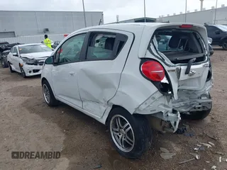 2014 Chevrolet Spark LT with VIN KL8CD6S94EC426322, listed as a IAAI auction lot 41894970 with 65,818 mi miles. Bid and sale history available at carsss.com. Image 3.