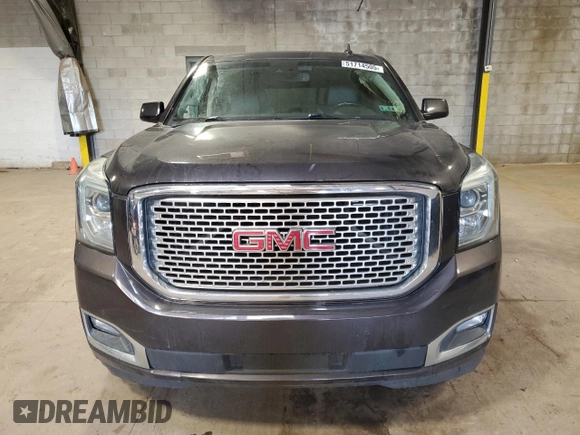 2015 GMC Yukon Denali with VIN 1GKS2CKJ2FR677604, listed as a Copart auction lot 51714505 with 146,648 mi miles and Salvage Title. Bid and sale history available at carsss.com. Image 5.