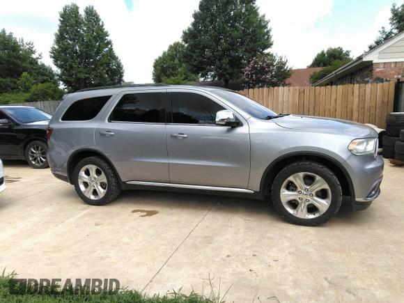 2015 Dodge Durango Limited with VIN 1C4RDJDGXFC810526, listed as a IAAI auction lot 42717037 with 158,160 mi miles and . Bid and sale history available at DreamBid. Image 13.