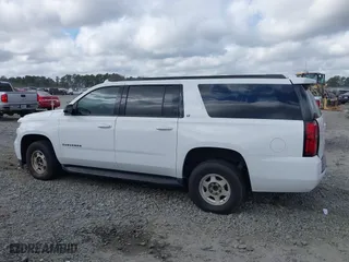 2019 Chevrolet Suburban LT with VIN 1GNSCHKC8KR405969, listed as a IAAI auction lot 41532271 with 107,003 mi miles. Bid and sale history available at carsss.com. Image 14.