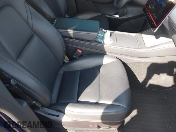 2022 Tesla Model Y Performance with VIN 7SAYGDEF7NF497076, listed as a IAAI auction lot 41759793 with 46,970 mi miles and . Bid and sale history available at DreamBid. Image 5.