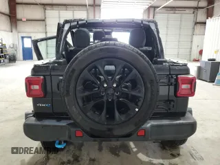 2024 Jeep Wrangler Sahara with VIN 1C4RJXP60RW257385, listed as a Copart auction lot 47660655 with 20,899 mi miles and Salvage title. Bid and sale history available at DreamBid. Image 6.