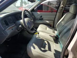 2004 Ford Crown Victoria LX с VIN 2FAFP74W44X184918, выставлен на аукционе Copart как лот 73346744 с пробегом 157 925 миль миль и Списание • Salvage title. История ставок и продаж доступна на DreamBid. Изображение 7.