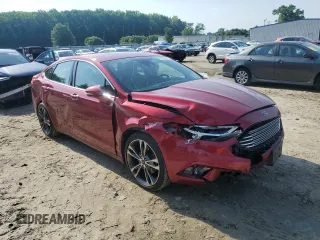 2017 Ford Fusion Titanium с VIN 3FA6P0D96HR208223, выставлен на аукционе Copart как лот 57019565 с пробегом 73 211 миль миль и Списание • Salvage title. История ставок и продаж доступна на DreamBid. Изображение 4.
