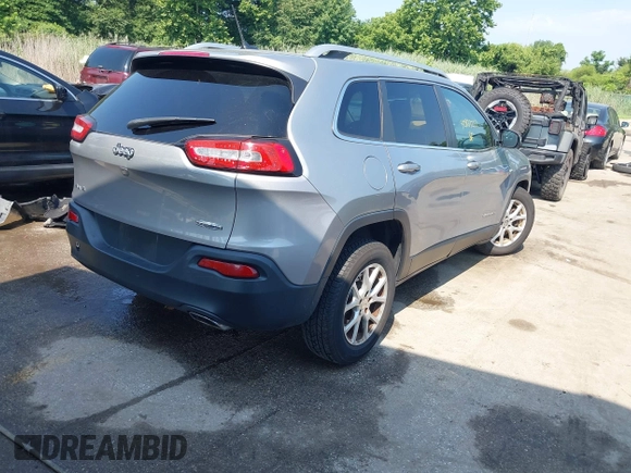 2015 Jeep Cherokee Latitude with VIN 1C4PJMCS2FW789144, listed as a IAAI auction lot 42837222 with 99,759 mi miles and . Bid and sale history available at DreamBid. Image 4.