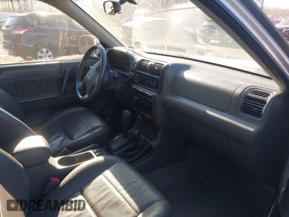 2002 Isuzu Rodeo z VIN 4S2DM58W524317574, wystawiony jako IAAI lot #41604546 z przebiegiem 150 000 mil mil oraz . Historia ofert i sprzedaży dostępna na DreamBid. Obrazek 5.