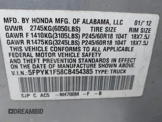 2012 Honda Ridgeline RTL with VIN 5FPYK1F58CB454385, listed as a IAAI auction lot 42212805 with 207,874 mi miles and . Bid and sale history available at DreamBid. Image 9.