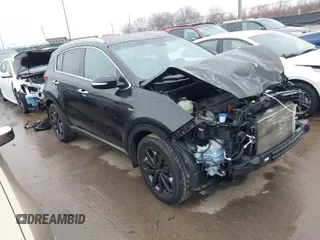 2018 Kia Sportage EX with VIN KNDPNCAC4J7409914, listed as a IAAI auction lot 41654833 with 142,057 mi miles and . Bid and sale history available at carsss.com. Image 1.