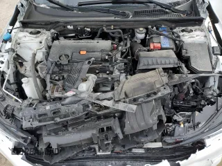 2022 Honda Civic Sport z VIN 2HGFE2F53NH119210, wystawiony jako Copart lot #51692345 z przebiegiem 58 785 mil mil oraz Szkoda całkowita • Salvage title. Historia ofert i sprzedaży dostępna na DreamBid. Obrazek 11.