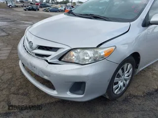 2012 Toyota Corolla L with VIN 2T1BU4EE9CC803165, listed as a IAAI auction lot 41924436 with 257,724 mi miles. Bid and sale history available at carsss.com. Image 6.